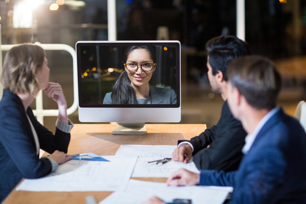 Business team having video conference in the conference room Business team having video conference in the conference room