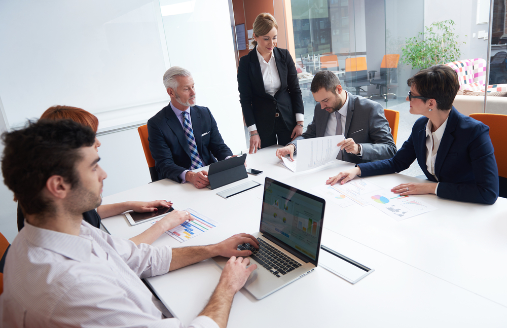 business people group with young adults and senior on meeting at modern bright office interior.-1 business people group with young adults and senior on meeting at modern bright office interior.-1